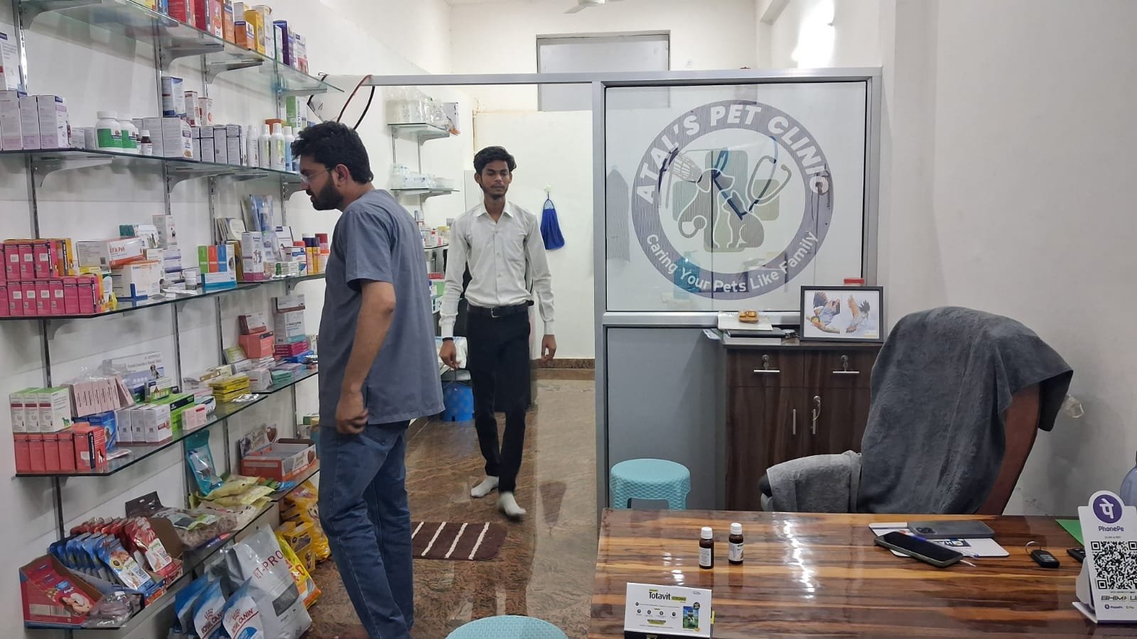 Well-stocked medicine shelf at Atal's Pet Clinic, Jaipur — comprehensive pet pharmacy